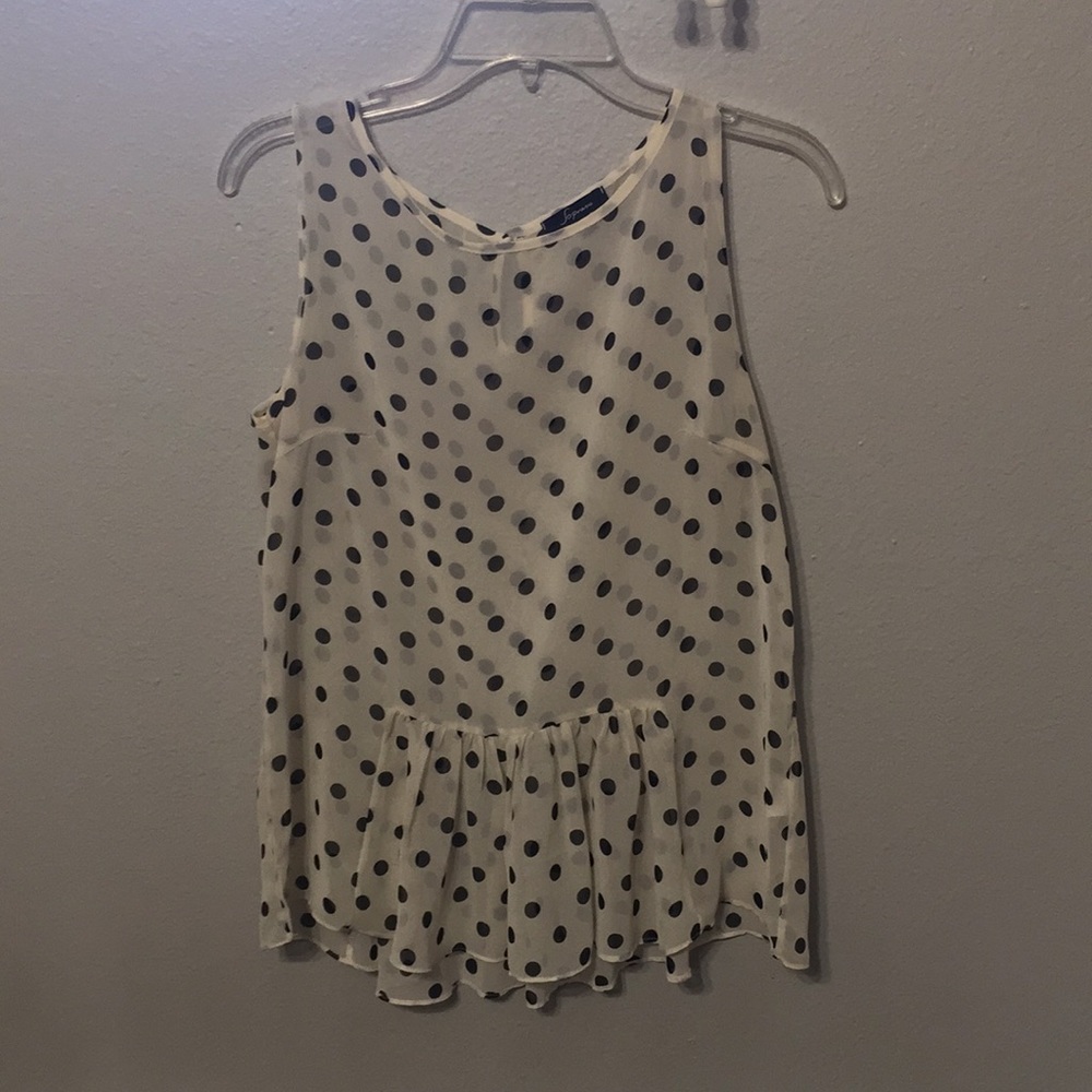 Sheer polka dot peplum top